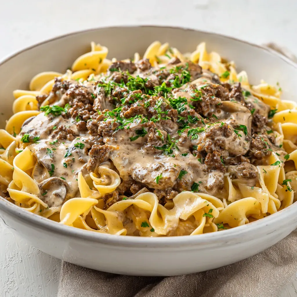 easy ground beef stroganoff saved my Tuesday night. I’d promised dinner by six, the dog stole my spatula
